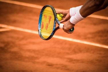 close-up-photo-of-person-holding-tennis-racket-and-ball-1432039 close-up-photo-of-person-holding-tennis-racket-and-ball-1432039